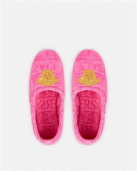 versace allover slippers.